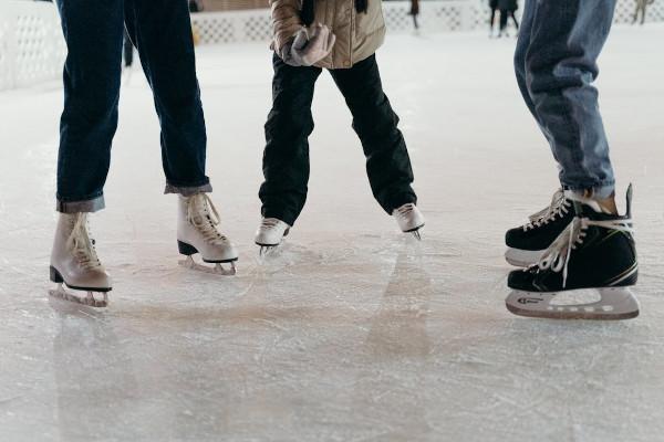 Three ice skaters